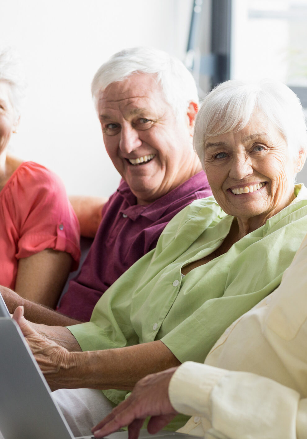 Seniors using tablets in a retirement home